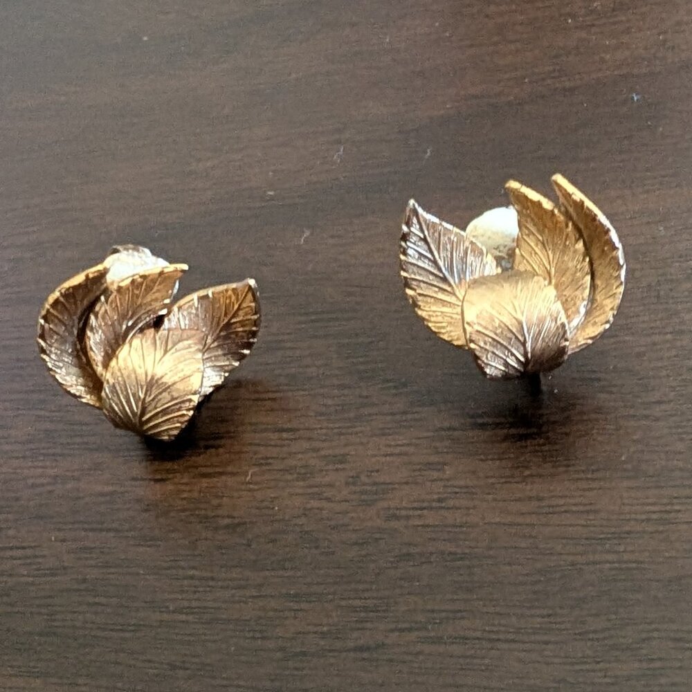 Vintage Coro gold tone textured leaf clip on earrings, stamped